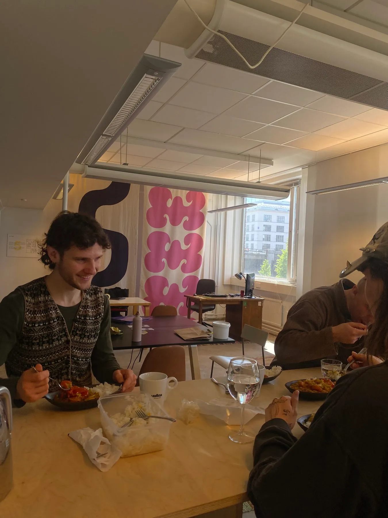 People having lunch together around a table